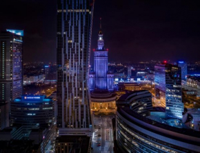 Room with a balcony in the very center of Warsaw